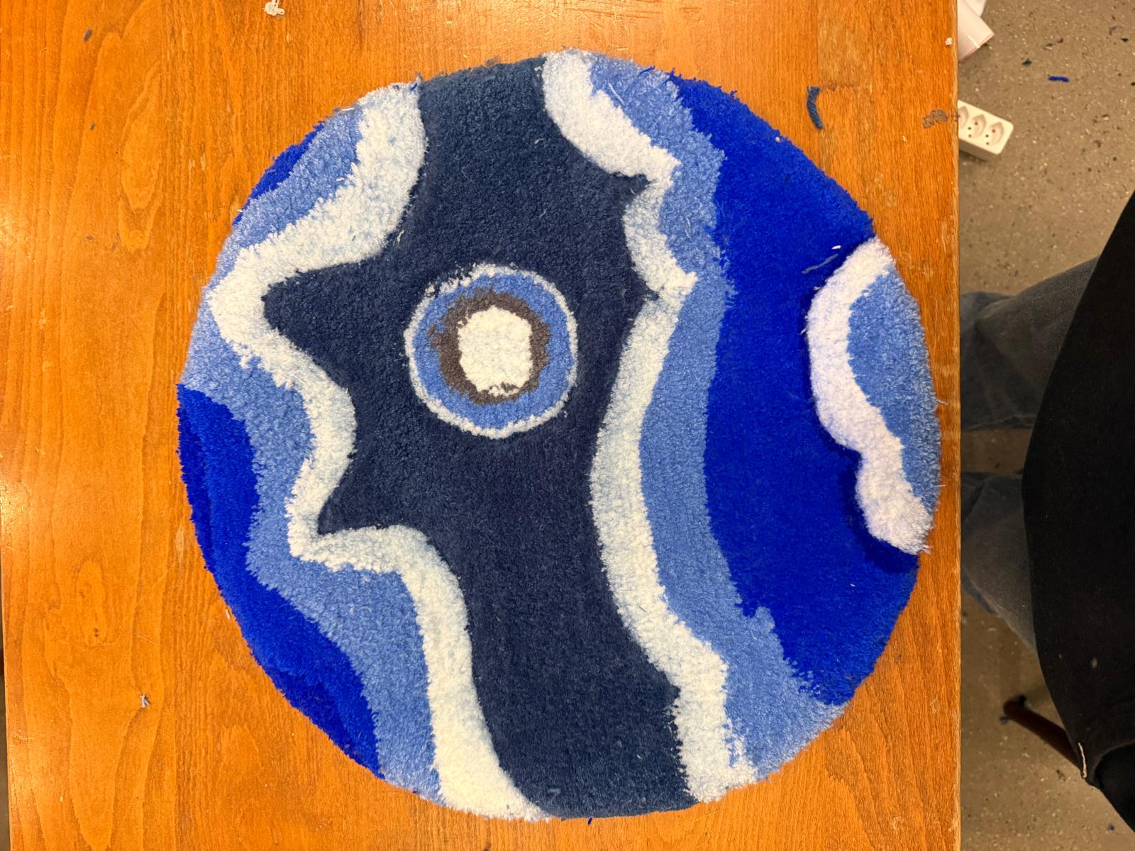 Tapis rond tufté en dégradés de bleu